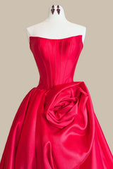 Elegant Strapless Corset Prom Dress with Statement Floral Accent and Voluminous Ball Gown Skirt