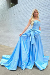 Light Blue Satin Prom Dress with Dramatic Bow and Flowy Skirt