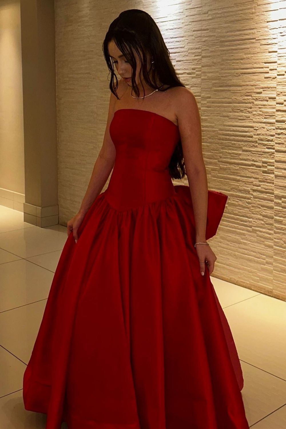 Elegant Red Strapless Ball Gown Prom Dress with Statement Bow Back