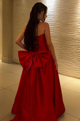 Elegant Red Strapless Ball Gown Prom Dress with Statement Bow Back