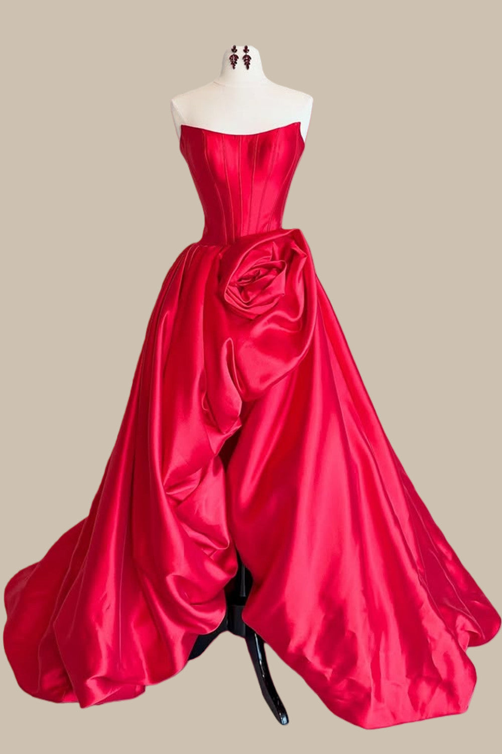 Elegant Strapless Corset Prom Dress with Statement Floral Accent and Voluminous Ball Gown Skirt