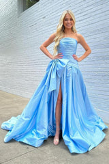 Light Blue Satin Prom Dress with Dramatic Bow and Flowy Skirt