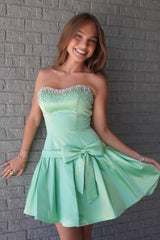 Mint Green Strapless Homecoming Dress with Beaded Neckline and Bow Skirt