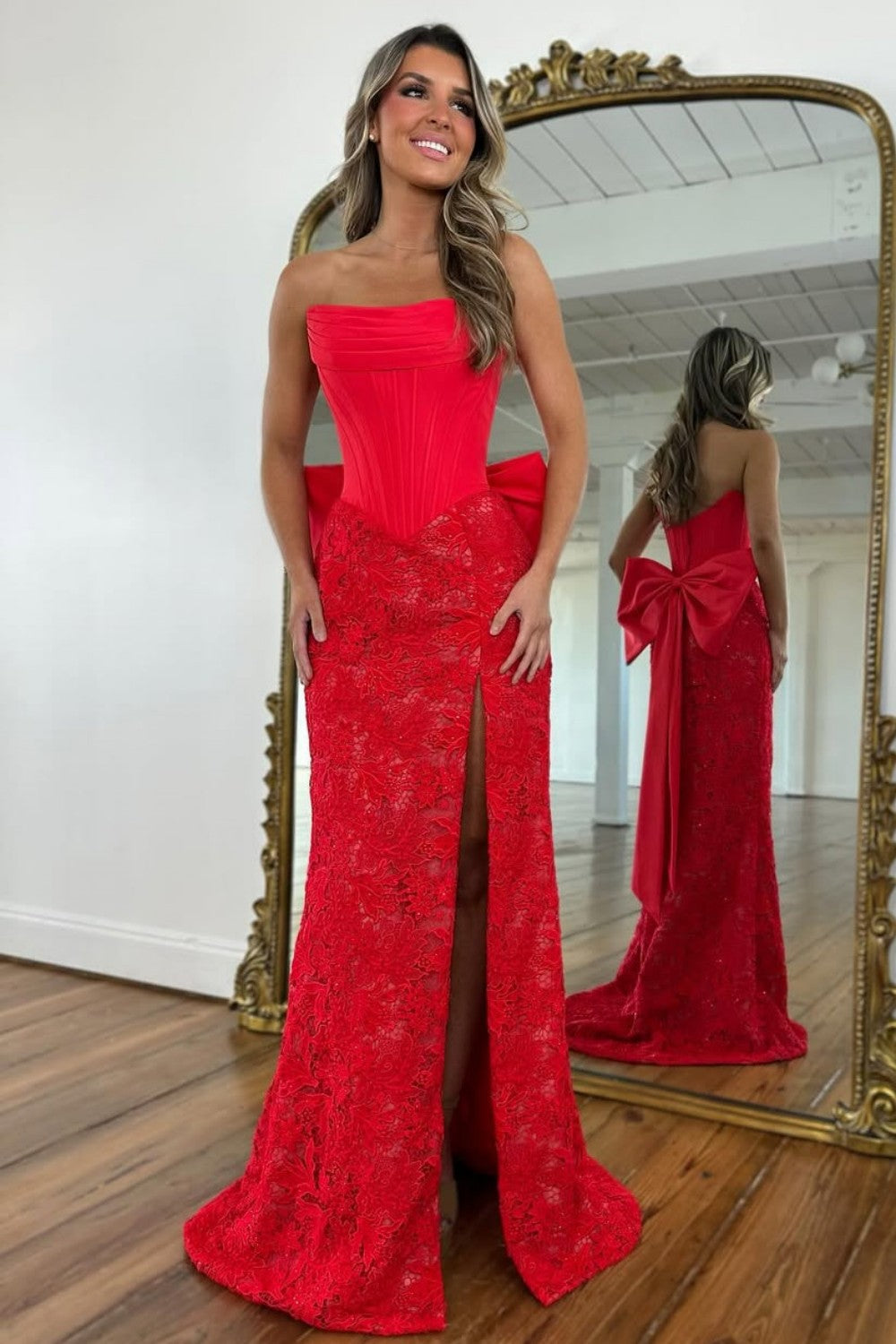 Red Lace Formal Gown with Structured Corset Bodice and Statement Bow