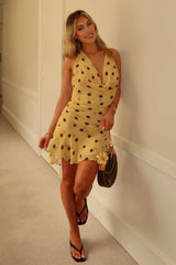 Yellow Polka Dot Homecoming Dress with Halter Neck and Open Back